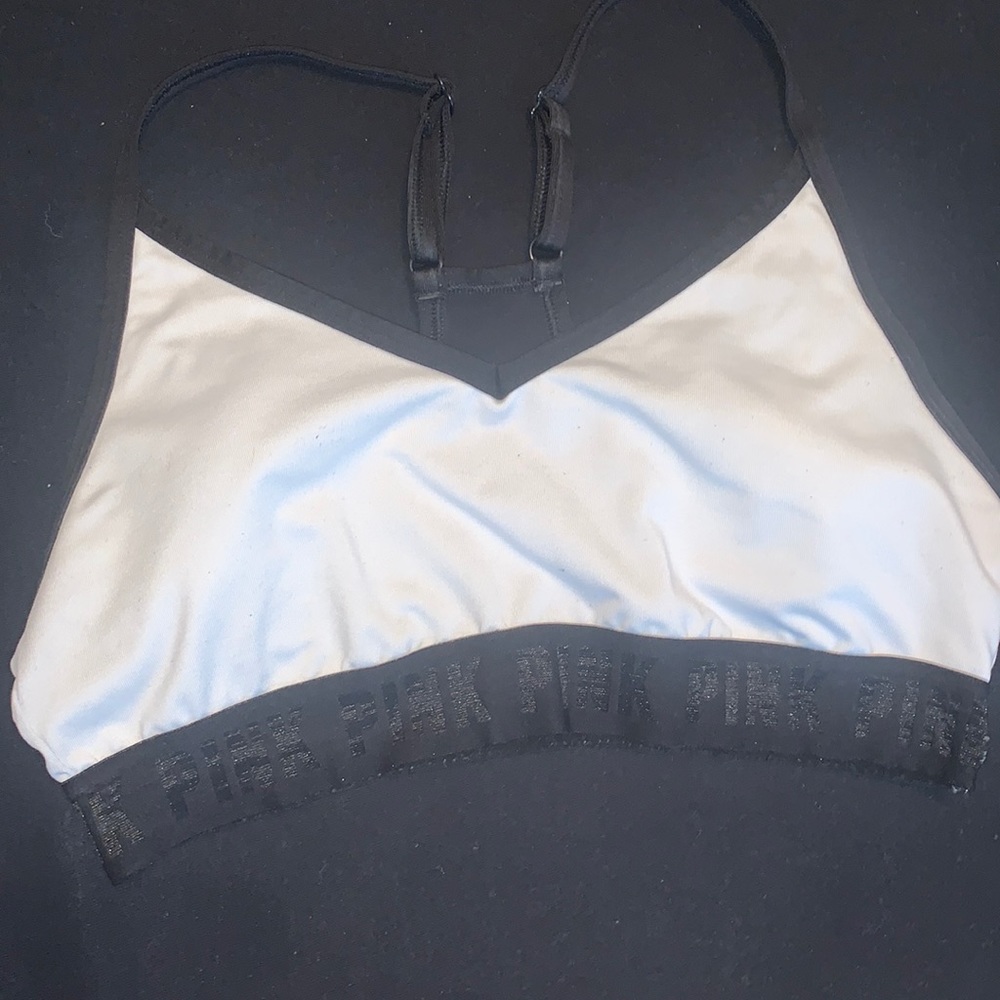 White and black sports bra. Worn a few times but no stains or odors. Size medium